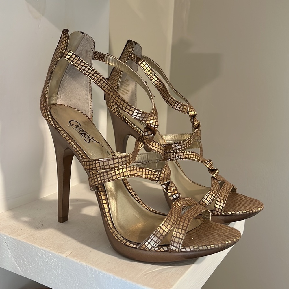 Carlos Santana gold heels